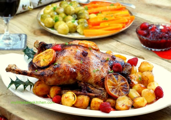 Roast duck with orange and berry sauce